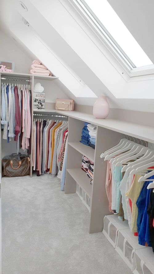 A picture of a dressing in a loft conversion.