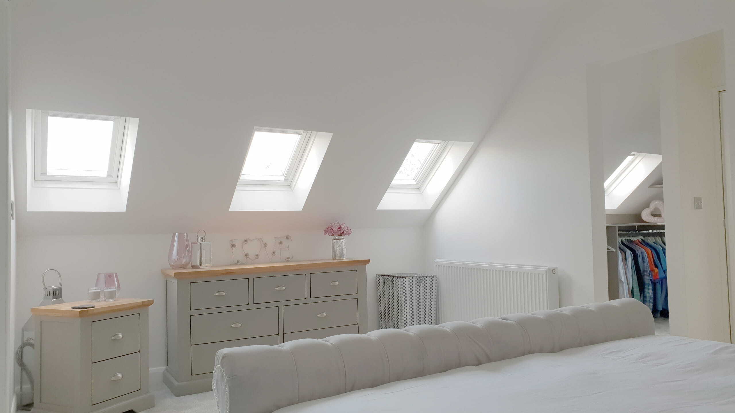 A loft conversion design, which turned the roof of this house into a master bedroom for the parents.