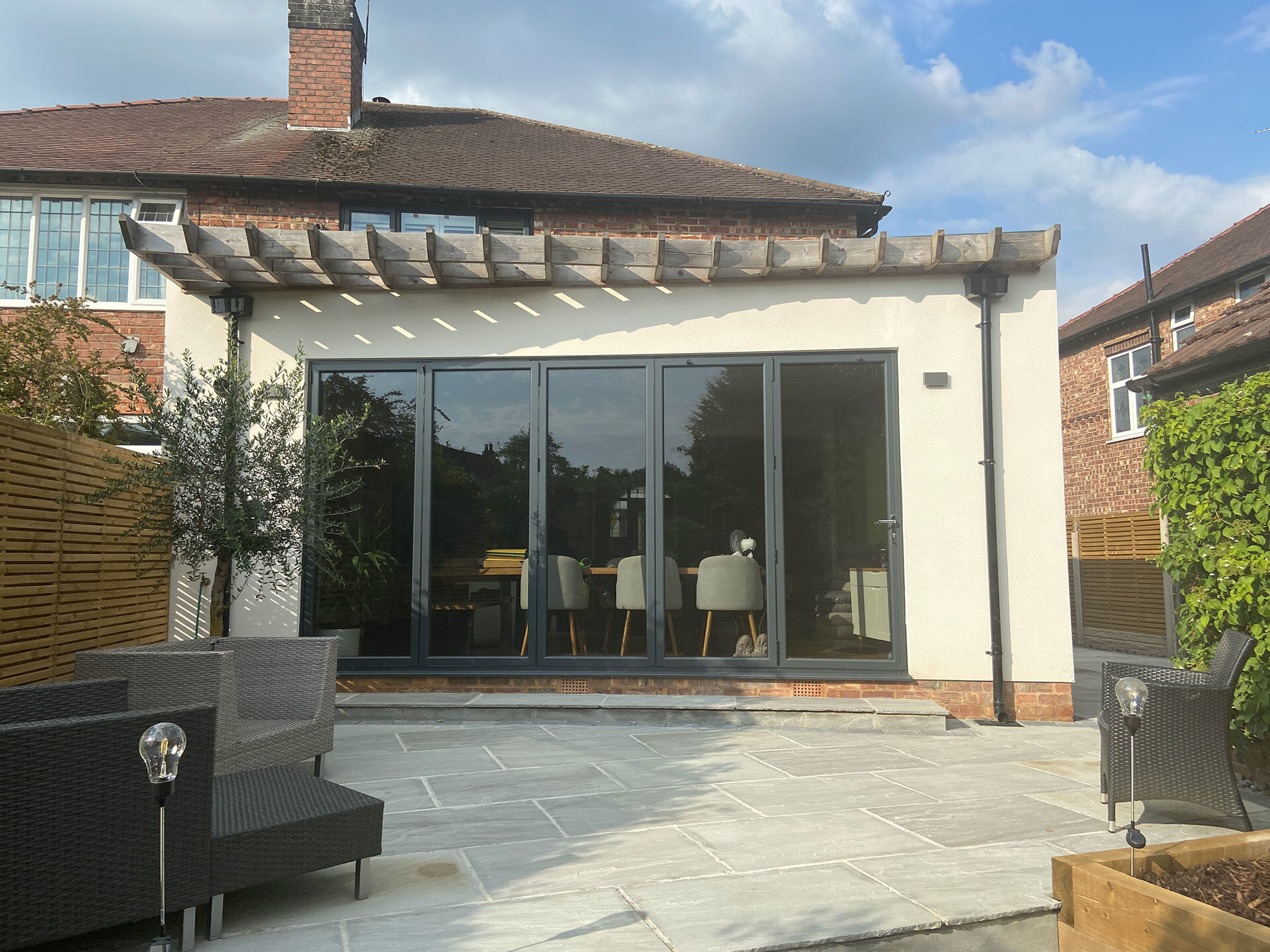 A house that has been extended following the size limits that have been imposed in the UK.